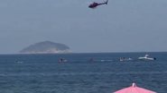 Imagem mostra helicóptero sobrevoando a área da queda. Foto: Reprodução/Redes Sociais