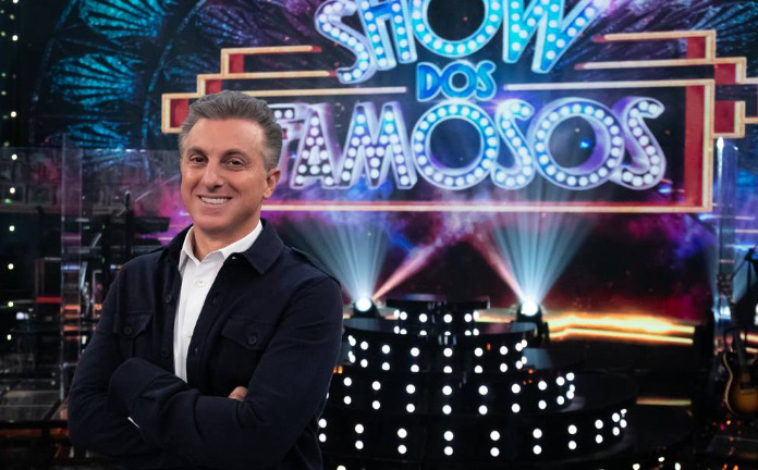 Segundo Flávio Bolsonaro, os recursos investidos pelo Banco Master na emissora teriam sido direcionados ao programa apresentado por Luciano Huck.